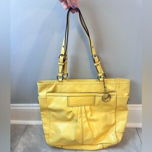 Yellow vinyl Coach tote